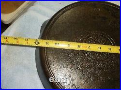 @12 Griswold, Erie, Pa, U. S. Cast Iron Skillet with 2 pour spouts and a fire ri