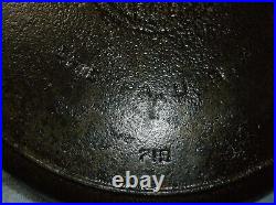 @12 Griswold, Erie, Pa, U. S. Cast Iron Skillet with 2 pour spouts and a fire ri