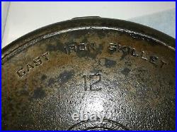 @12 Griswold, Erie, Pa, U. S. Cast Iron Skillet with 2 pour spouts and a fire ri