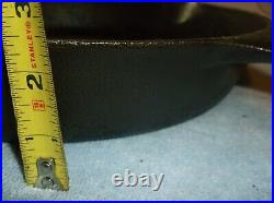 @12 Griswold, Erie, Pa, U. S. Cast Iron Skillet with 2 pour spouts and a fire ri