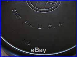 A+ CAST IRON GRISWOLD SKILLET NUMBER 12 LARGE LOGO WITH HEAT RING