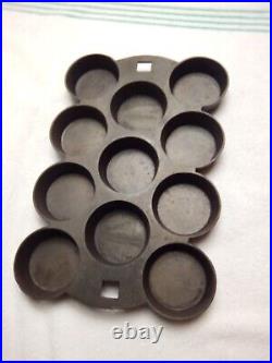 Antique 11 Cup Cast Iron muffin pan with gate marks
