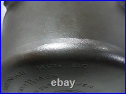 Griswold #11 Tite Top dutch oven with lid and trivet