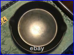 Griswold #9 skillet with heat ring. Slant Logo. Cast Iron. 710