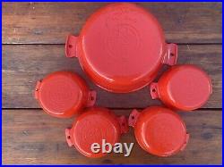 Griswold Cast Iron Matching Casserole Set in Red and White Enamel