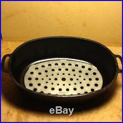 Griswold Cast Iron No. 7 Oval Roaster with Aluminum Trivet A487T