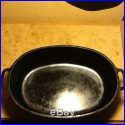 Griswold Cast Iron No. 7 Oval Roaster with Aluminum Trivet A487T