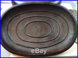 Griswold No. 9 Cast Iron Oval Roaster Partially Marked Top Block Logo w Trivet