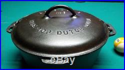 Griswold No. 9 Tite Top Dutch Oven With Low Dome Wire Handle Lid. Block Logo