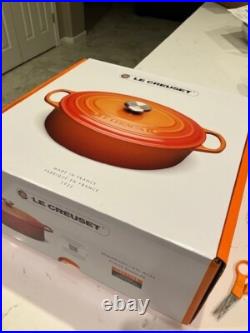 Le Creuset Signature Enameled Cast Iron Round Wide Dutch Oven 6 3/4-Qt. Cerise