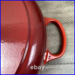 Le Creuset Signature Enameled Cast Iron Round Wide Dutch Oven 6 3/4-Qt. Red Read