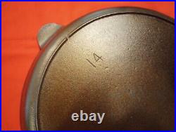 Lodge Early#14 3 notch with An F MM. Really nice pan. Vintage Cast Iron Skillet