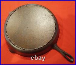 Lodge Early#14 3 notch with An F MM. Really nice pan. Vintage Cast Iron Skillet