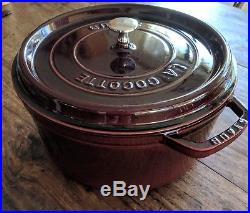 New (no box) Staub Cast Iron 7-qt Round Cocotte, French (Dutch) Oven. Grenadine