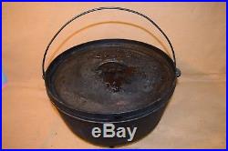 Vintage 3 Footed Lodge Cast Iron Dutch Oven No. 14 Cooking Pot with Lid Seasoned