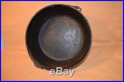 Vintage 3 Footed Lodge Cast Iron Dutch Oven No. 14 Cooking Pot with Lid Seasoned