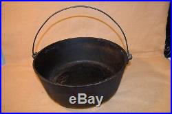 Vintage 3 Footed Lodge Cast Iron Dutch Oven No. 14 Cooking Pot with Lid Seasoned