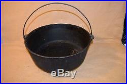 Vintage 3 Footed Lodge Cast Iron Dutch Oven No. 14 Cooking Pot with Lid Seasoned