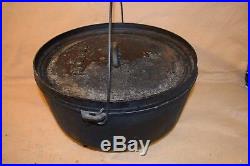 Vintage 3 Footed Lodge Cast Iron Dutch Oven No. 14 Cooking Pot with Lid Seasoned