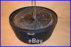 Vintage 3 Footed Lodge Cast Iron Dutch Oven No. 14 Cooking Pot with Lid Seasoned